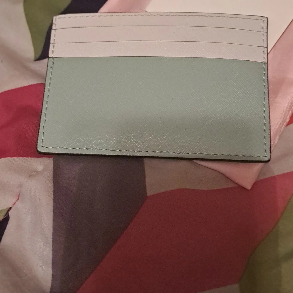 Kate Spade  Mint  cardholder with dust Bag NWT